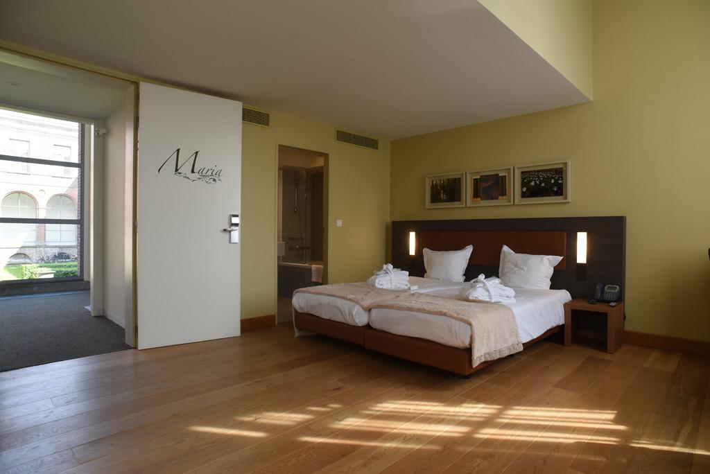 Het Godshuis Hotel Sint-Laureins Esterno foto